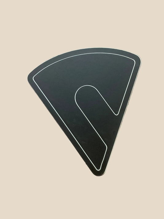 Black triangular sticker with white border 